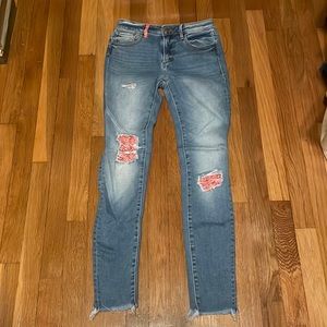 AQUA SKINNY JEANS FROM BLOOMINGDALES FEATURE BANDANA PATCHES 25